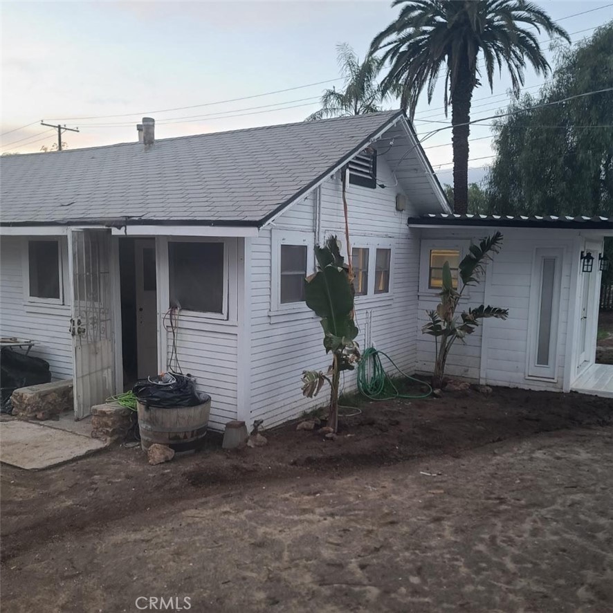 10560 Robinson Avenue Riverside, CA 92505 - Photo 8 of 11 a front view of a house with garden