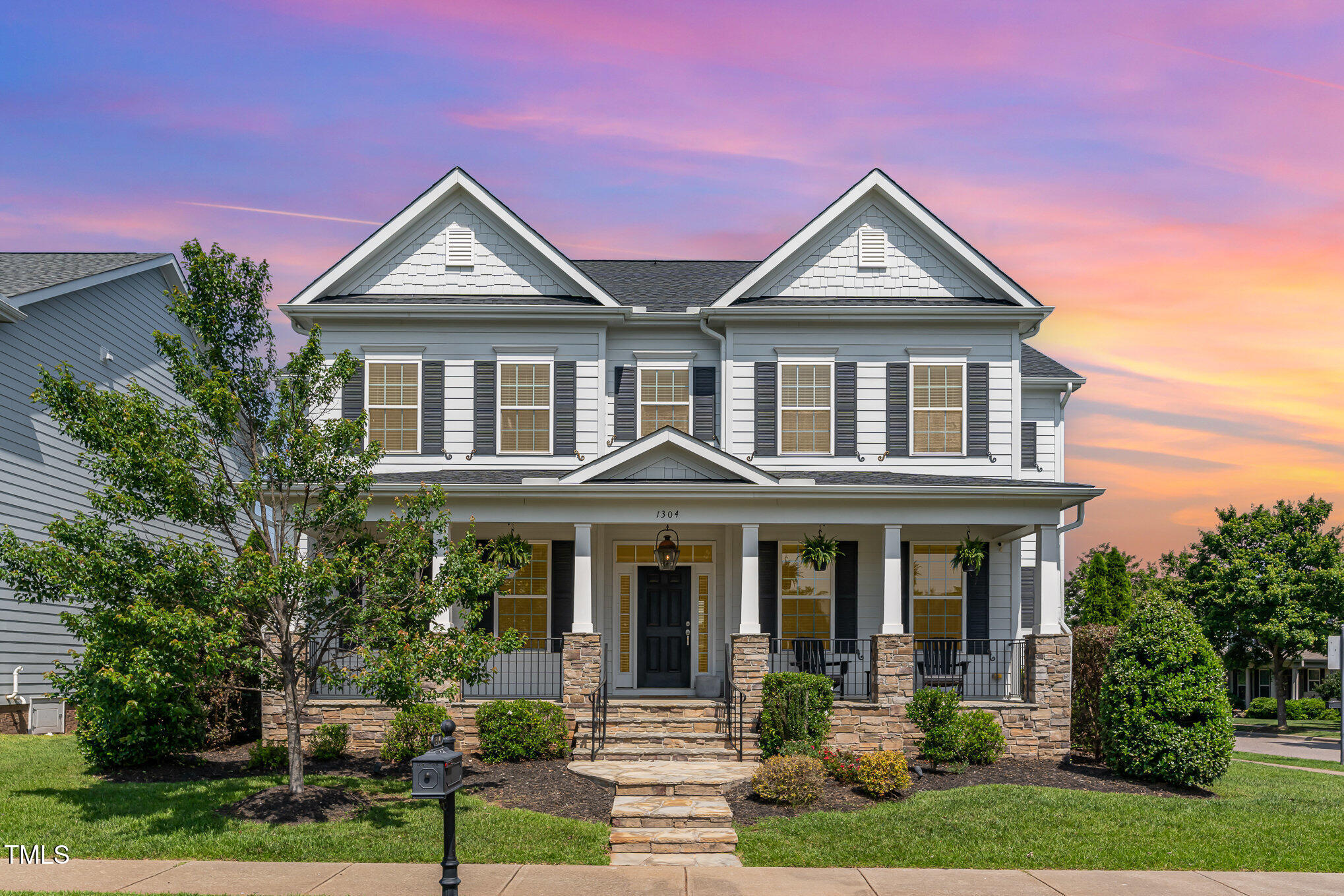 1304 Revolution Circle Raleigh, NC 27603 - Photo 1 of 17 a front view of a house with yard