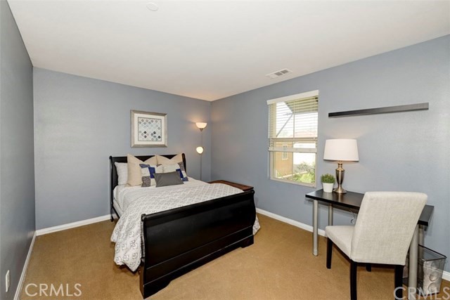 184 Pathway Irvine, CA 92618 - Photo 6 of 7 a bedroom with a bed and a window