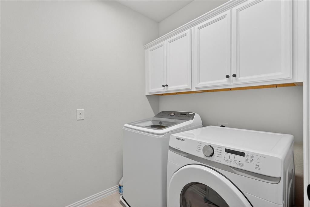 651 Watters Road, Unit 5305 Allen, TX 75013 - Photo 21 of 40 a utility room with dryer and washer