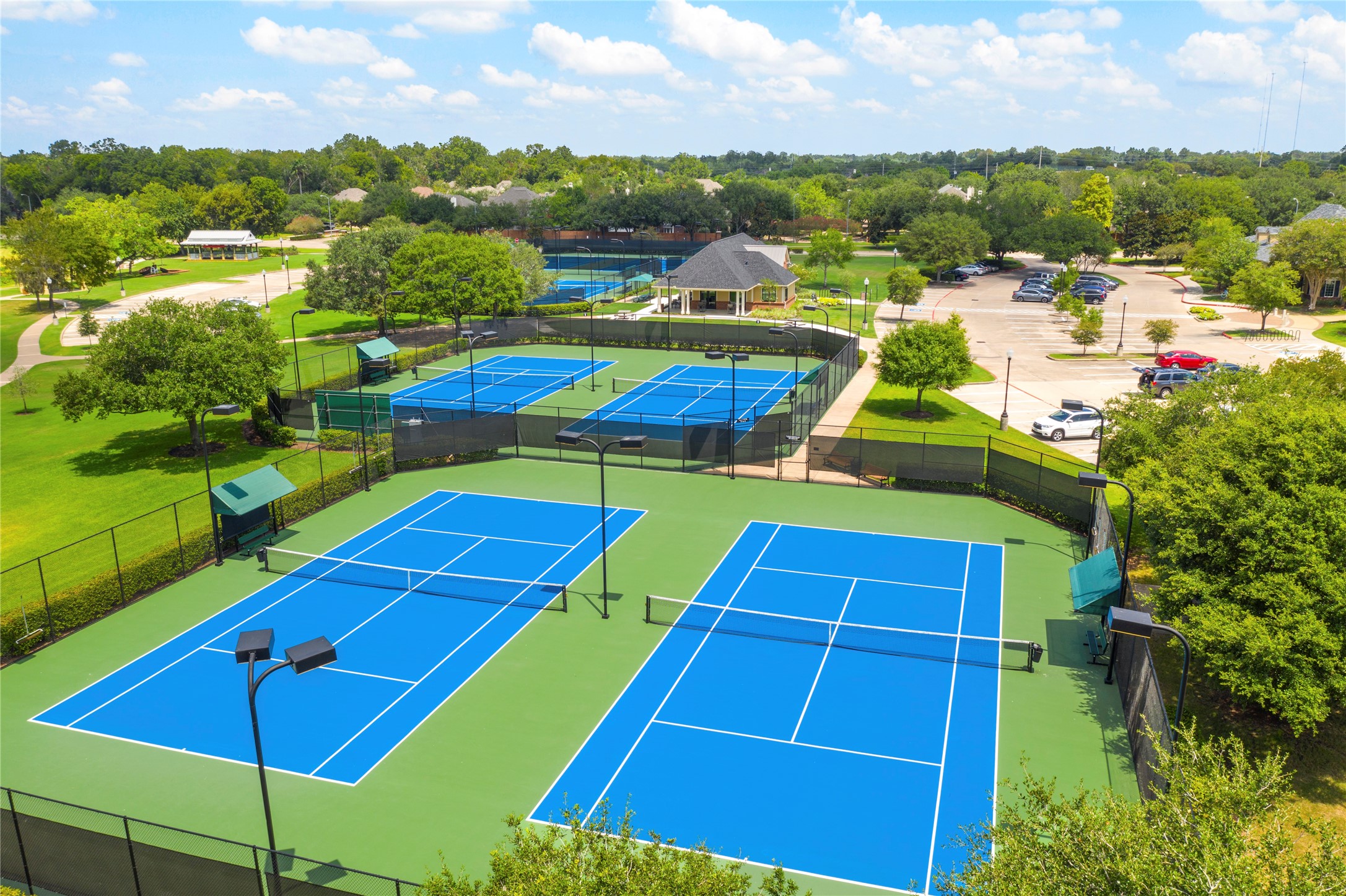 10931 Middle Rdg Drive Missouri City, TX 77459 - Photo 42 of 45 Grab a friend for a singles or doubles match! Sienna residents can reserve a court or walk up and play!