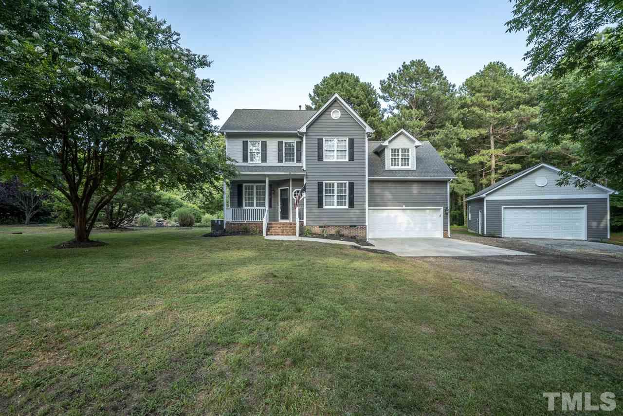 11508 John Allen Road Raleigh, NC 27614 - Photo 2 of 25 a front view of a house with a yard and trees