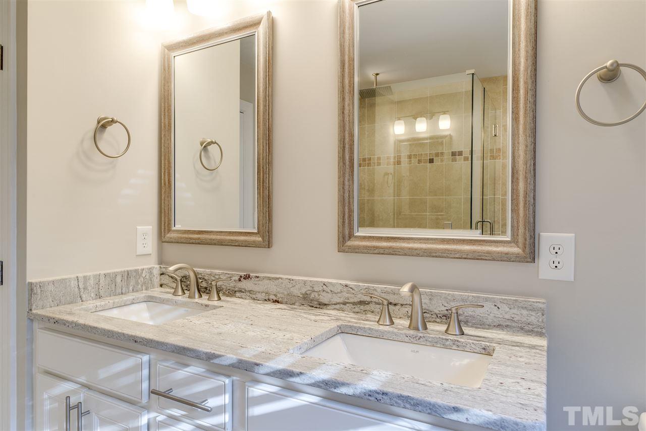 11508 John Allen Road Raleigh, NC 27614 - Photo 14 of 25 a bathroom with a granite countertop sink and a mirror
