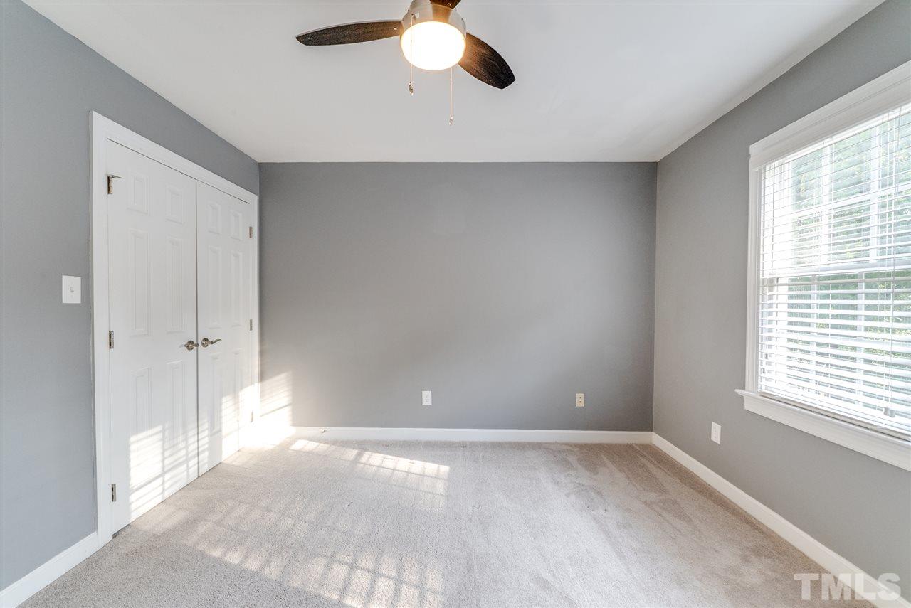 11508 John Allen Road Raleigh, NC 27614 - Photo 16 of 25 a view of an empty room with a window