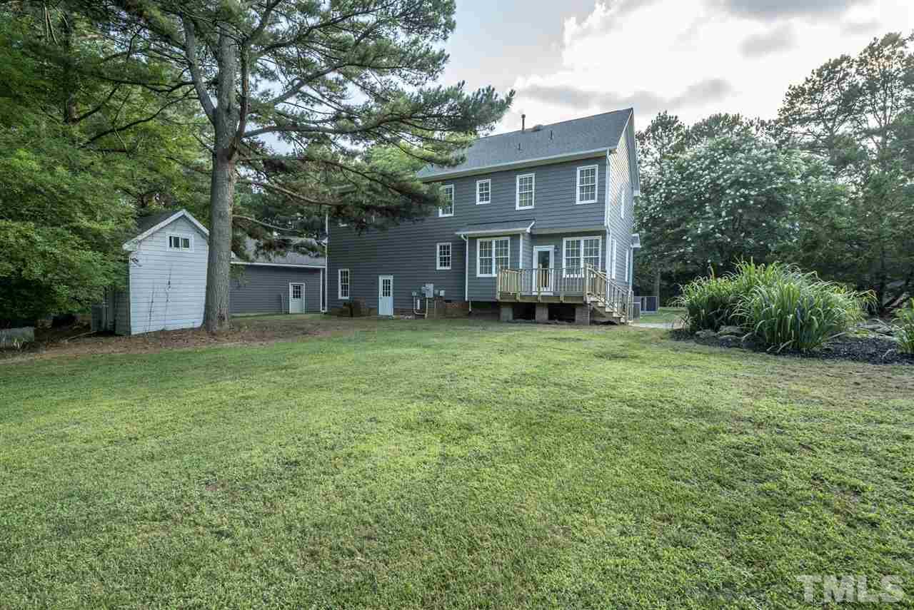 11508 John Allen Road Raleigh, NC 27614 - Photo 20 of 25 a view of a house with a yard and sitting area