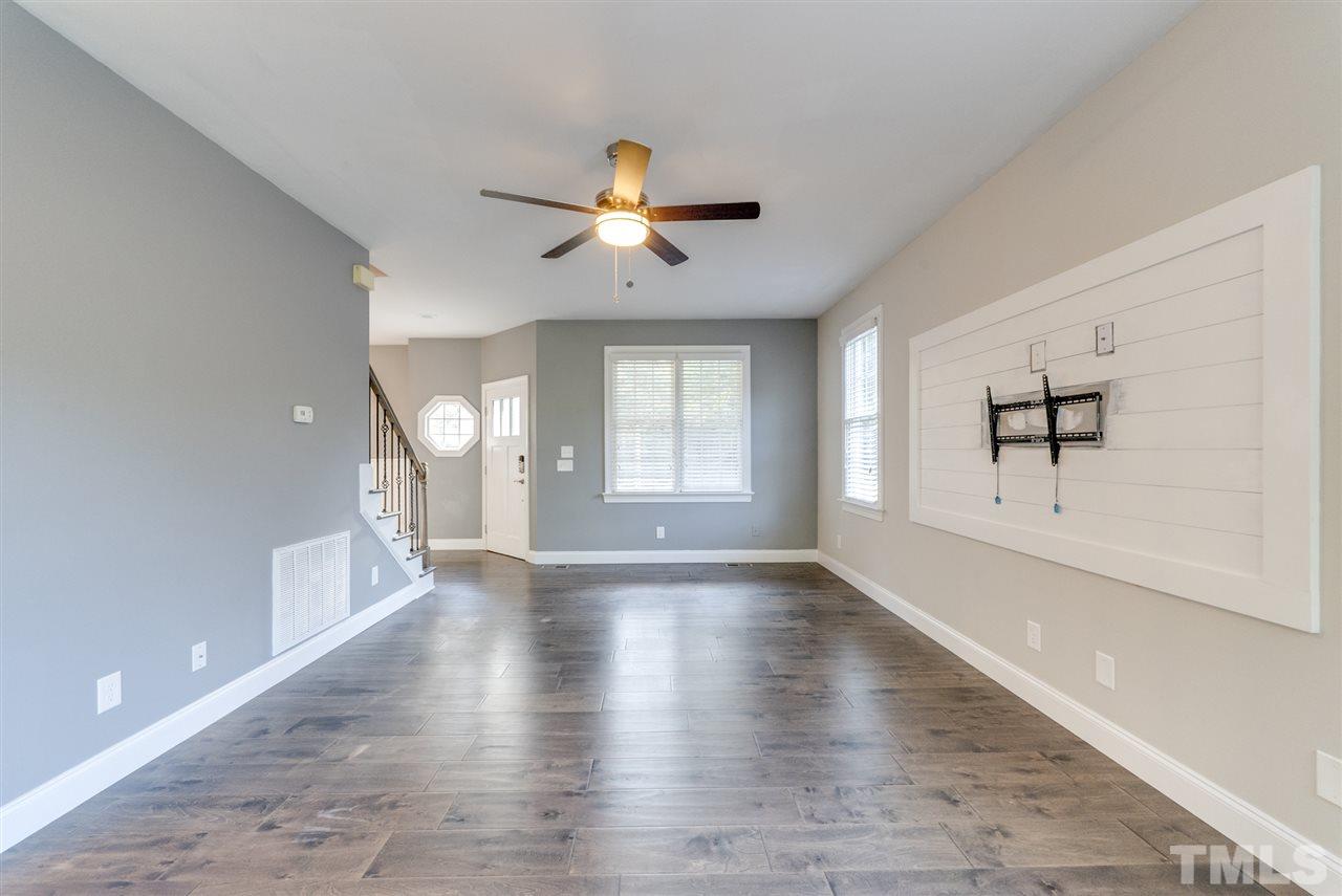 11508 John Allen Road Raleigh, NC 27614 - Photo 5 of 25 wooden floor in an empty room with a window