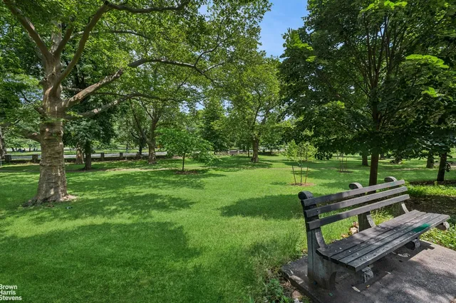 a view of a parked cars in front of a building