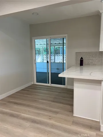 a view of kitchen and sink