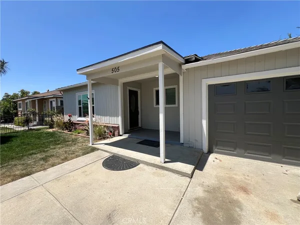 a view of a house with a patio