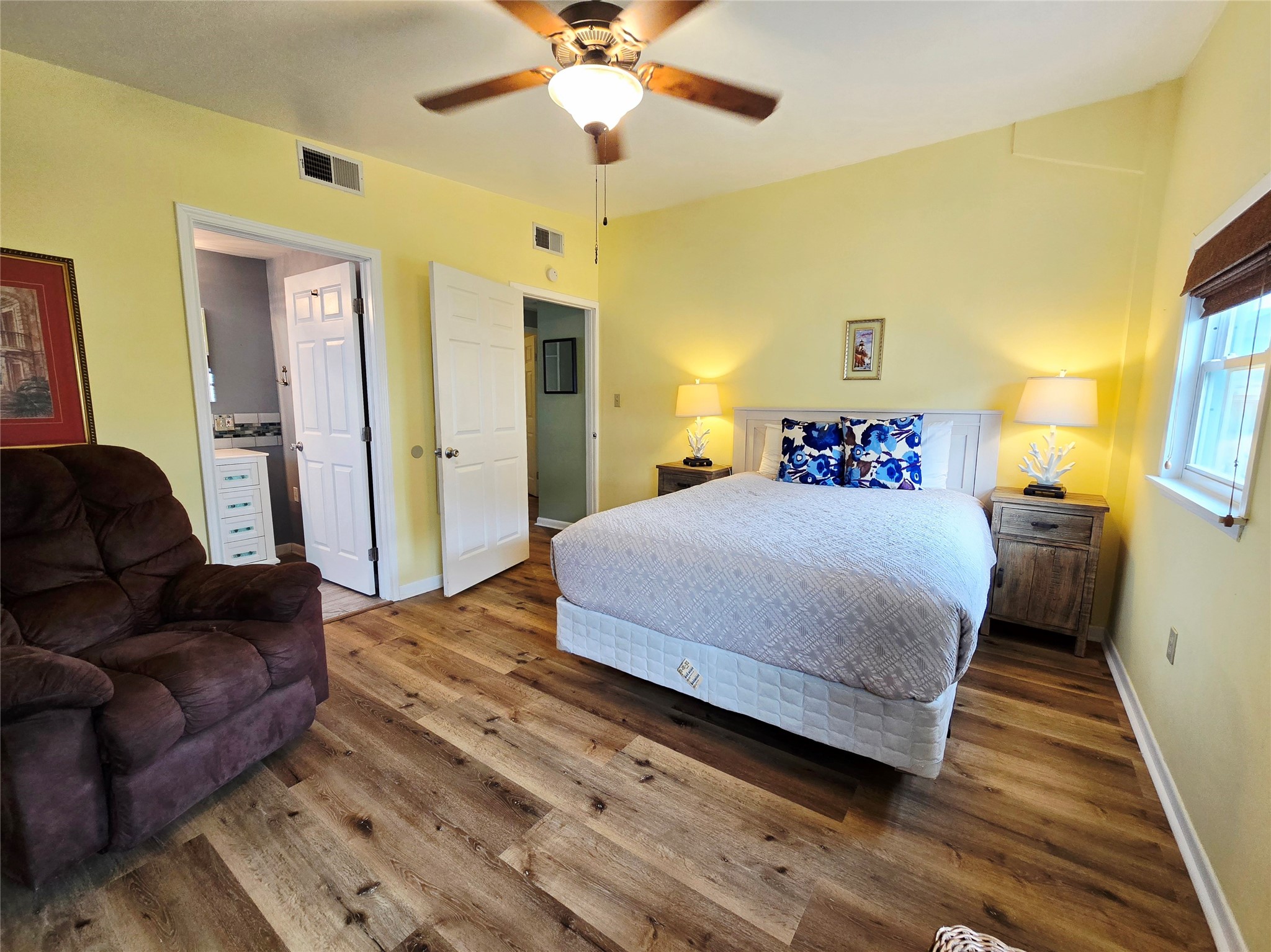 16611 Jolly Roger Road Jamaica Beach, TX 77554 - Photo 23 of 49 a bedroom with a bed and a couch