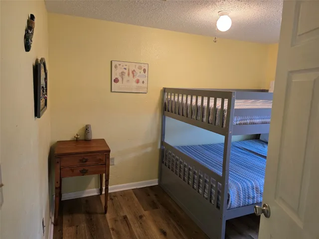 a balcony with wooden floor