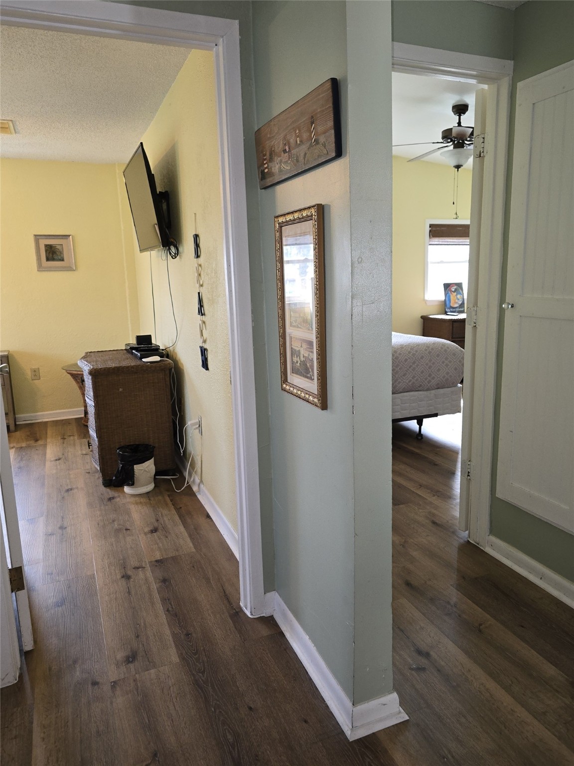 16611 Jolly Roger Road Jamaica Beach, TX 77554 - Photo 37 of 49 a living room with furniture and a flat screen tv