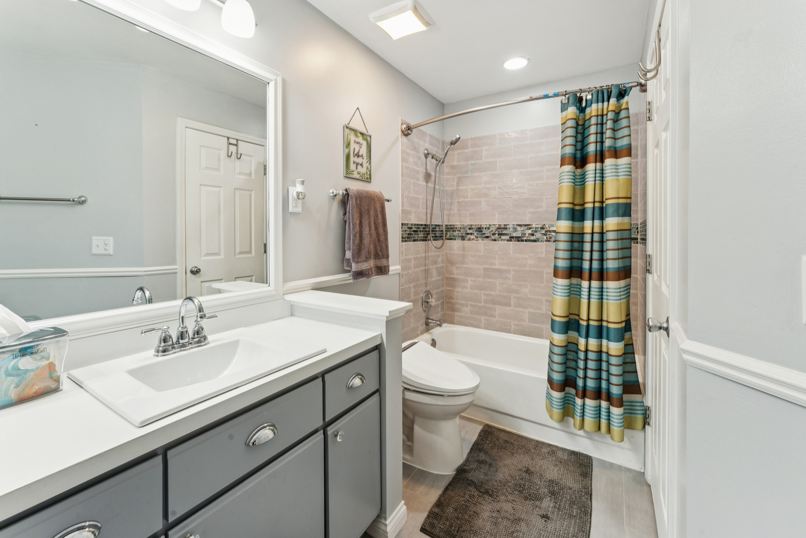 159 West Hamilton Drive Palatine, IL 60067 - Photo 16 of 24 a bathroom with a sink toilet a shower and a mirror