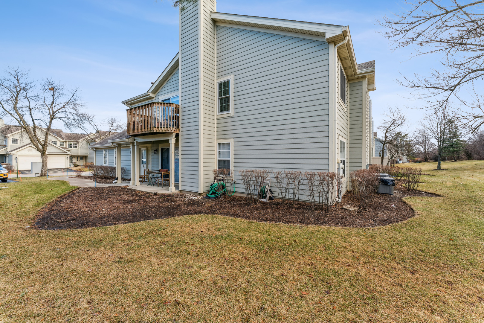 159 West Hamilton Drive Palatine, IL 60067 - Photo 21 of 24 a front view of a house with a yard and garage