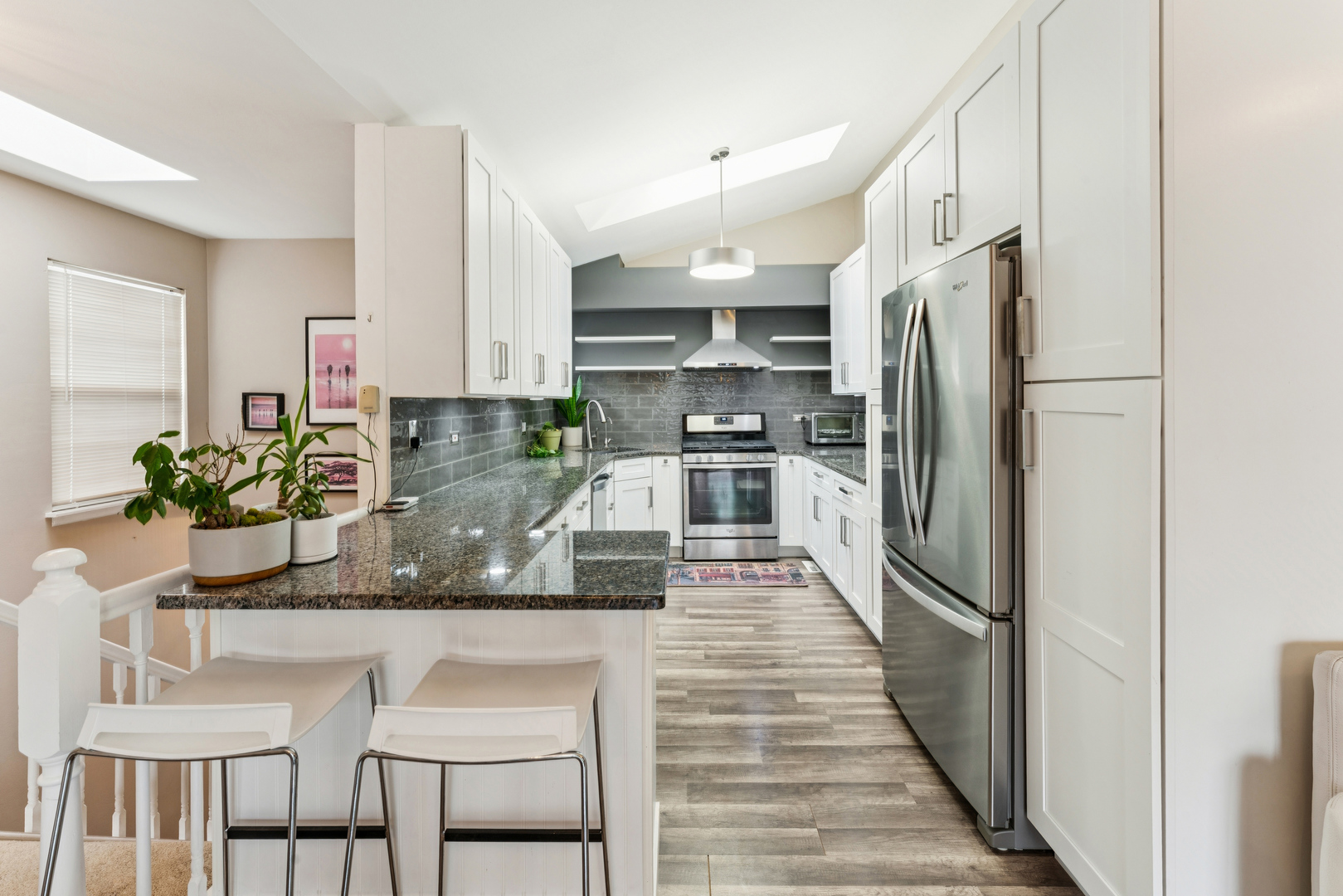 159 West Hamilton Drive Palatine, IL 60067 - Photo 9 of 24 a kitchen with stainless steel appliances kitchen island granite countertop a refrigerator and a stove