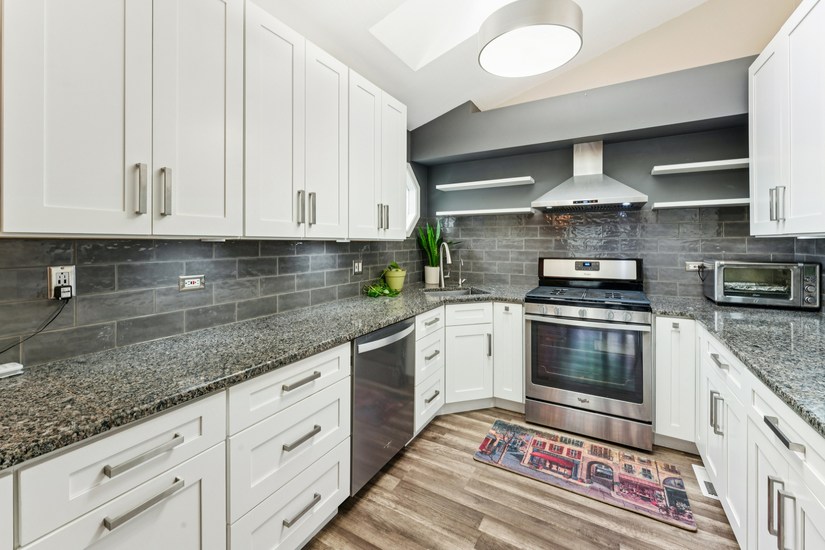 159 West Hamilton Drive Palatine, IL 60067 - Photo 10 of 24 a kitchen with granite countertop a sink stainless steel appliances and cabinets