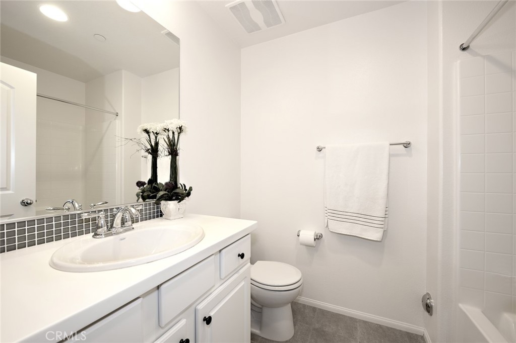 443 Stratus Lane, Unit 4 Simi Valley, CA 93065 - Photo 30 of 32 a bathroom with a sink toilet and shower