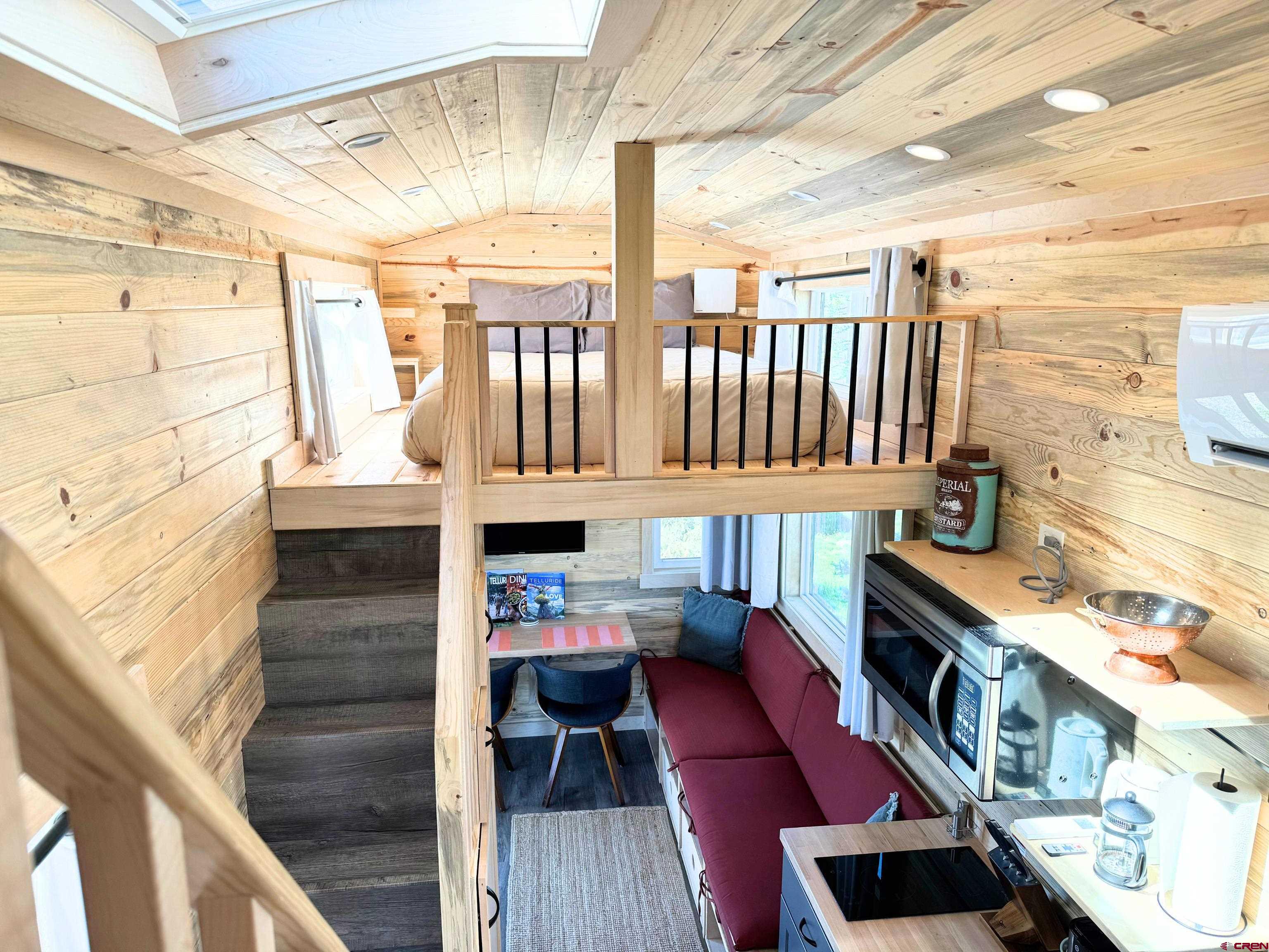22130 6850 Road, Unit 211 Montrose, CO 81403 - Photo 6 of 25 a view of entryway with wooden floor