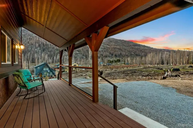a view of porch with wooden floor