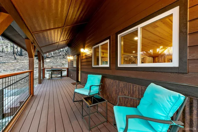 a view of a chairs on the roof deck