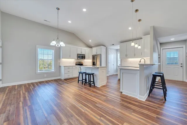 a view of a balcony with wooden floor