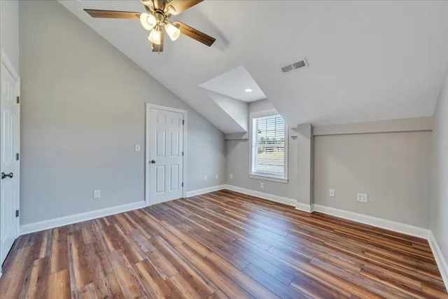 a view of a brick house with an empty space