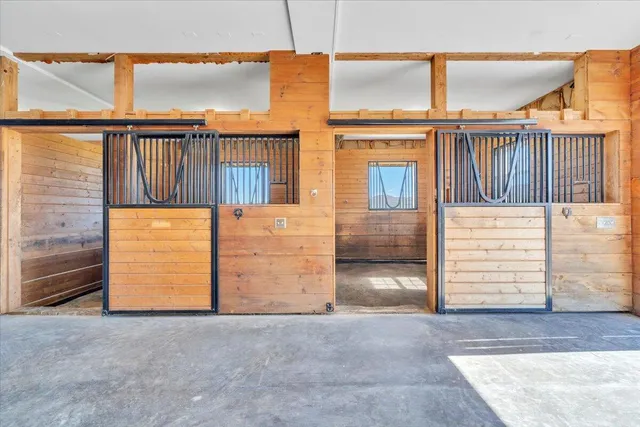 a view of a swimming pool with an outdoor seating and a yard