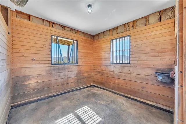 a view of a swimming pool with an outdoor space and seating area