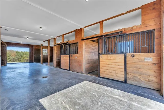 a view of a swimming pool with a lake view and mountain view