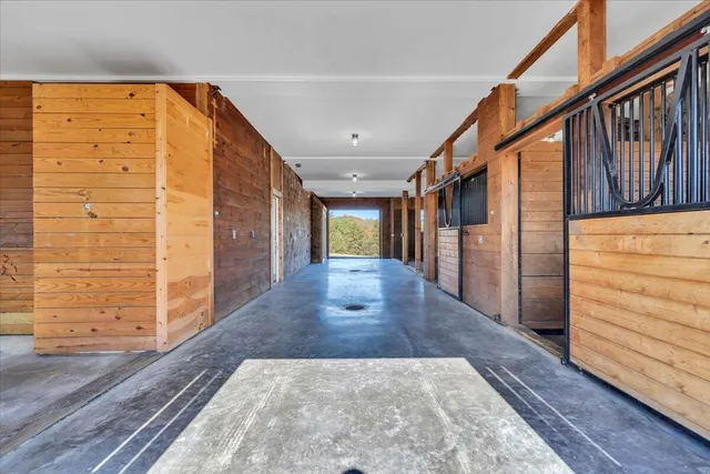 a view of a swimming pool with a yard