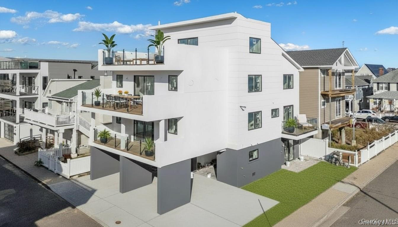 a front view of a building with many windows