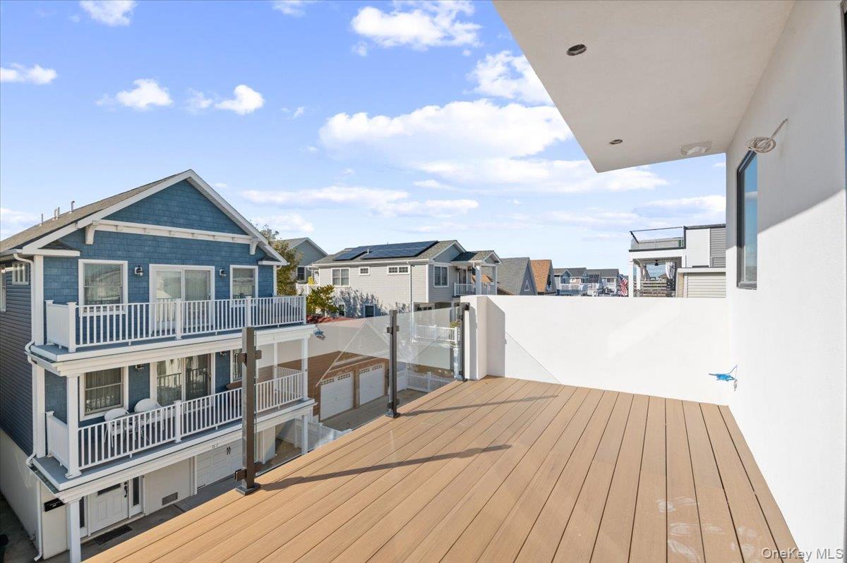 56 Oregon Street Long Beach, NY 11561 - Photo 8 of 25 Wooden deck featuring a residential view