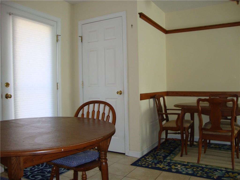 33 Cobblestone Lane Westerly, RI 02891 - Photo 16 of 23 backdoor/kitchen/dining area