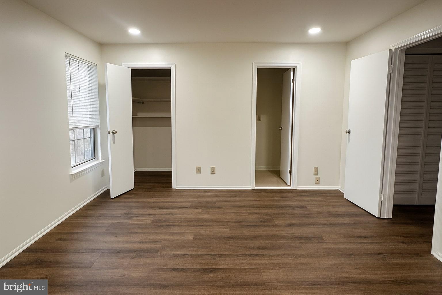 329 Gwynedd Court Mount Laurel, NJ 08054 - Photo 11 of 15 a view of an empty room with wooden floor and closet