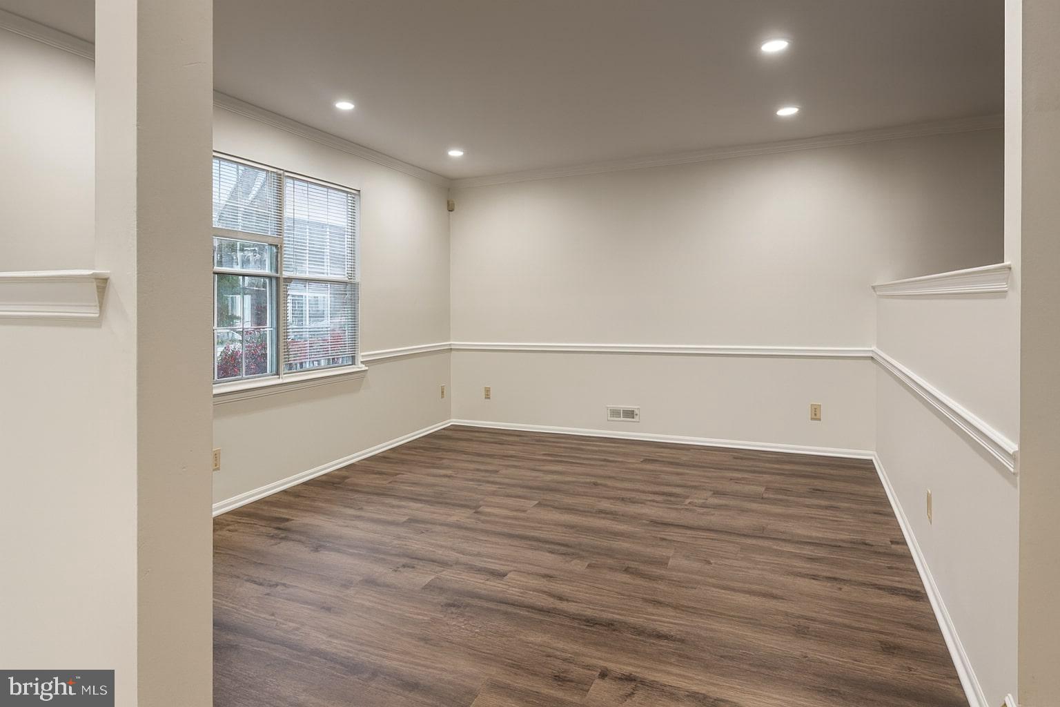 329 Gwynedd Court Mount Laurel, NJ 08054 - Photo 4 of 15 a view of a big room with wooden floor and windows in a room