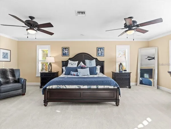 a kitchen with stainless steel appliances granite countertop a refrigerator and a stove