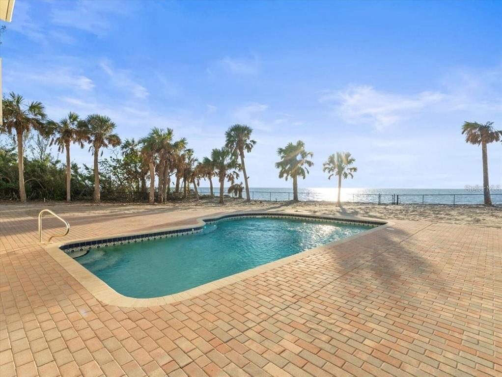 8030 Manasota Key Road Englewood, FL 34223 - Photo 8 of 67 a view of swimming pool with a yard