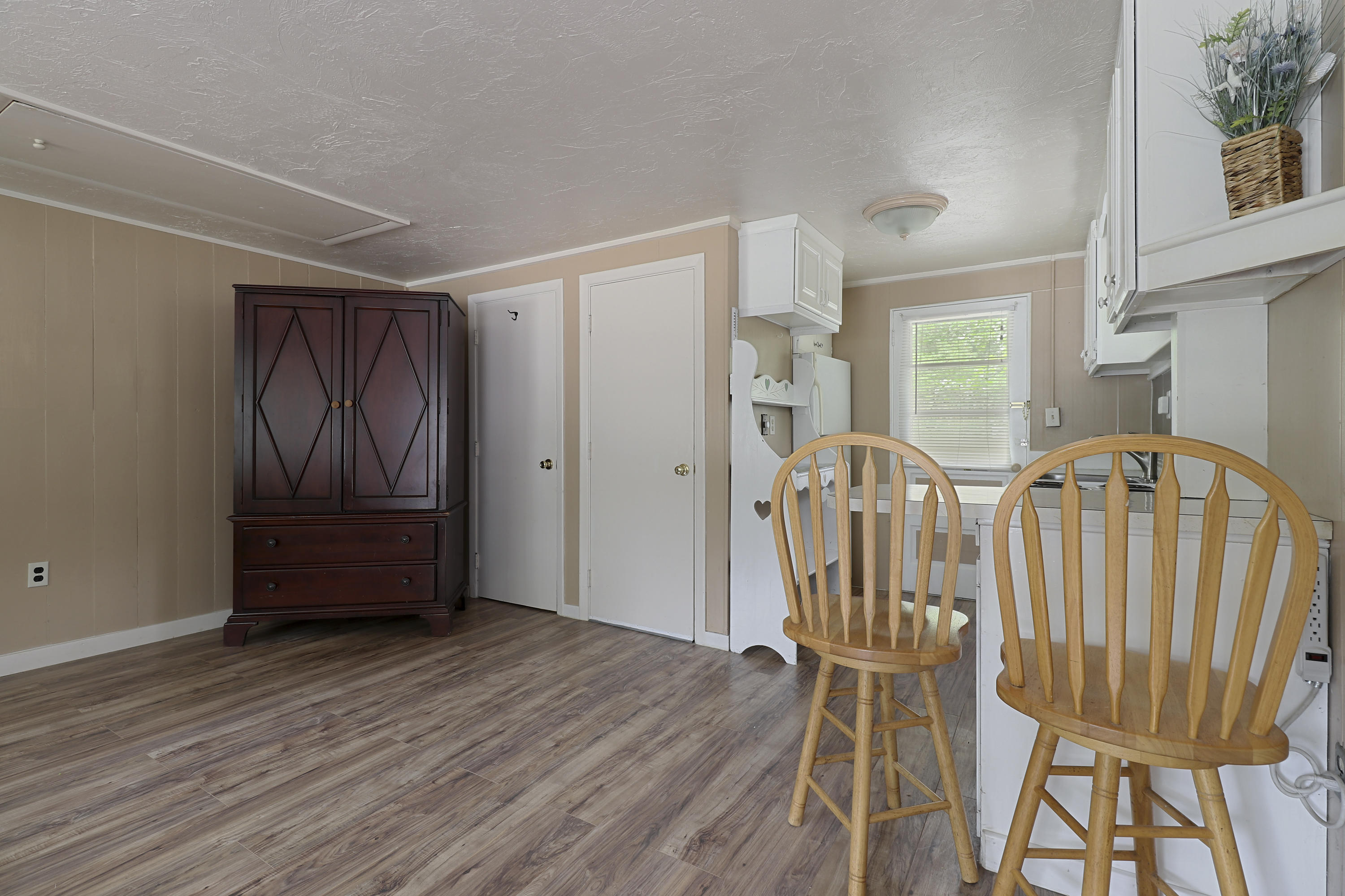 3546 Main Street, Unit 9 Brewster, MA 02631 - Photo 4 of 14 a view of room with furniture and wooden floor