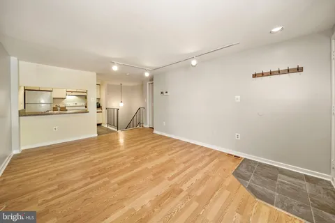 a view of a kitchen with a dishwasher and cabinets