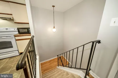 a view of a kitchen with a sink