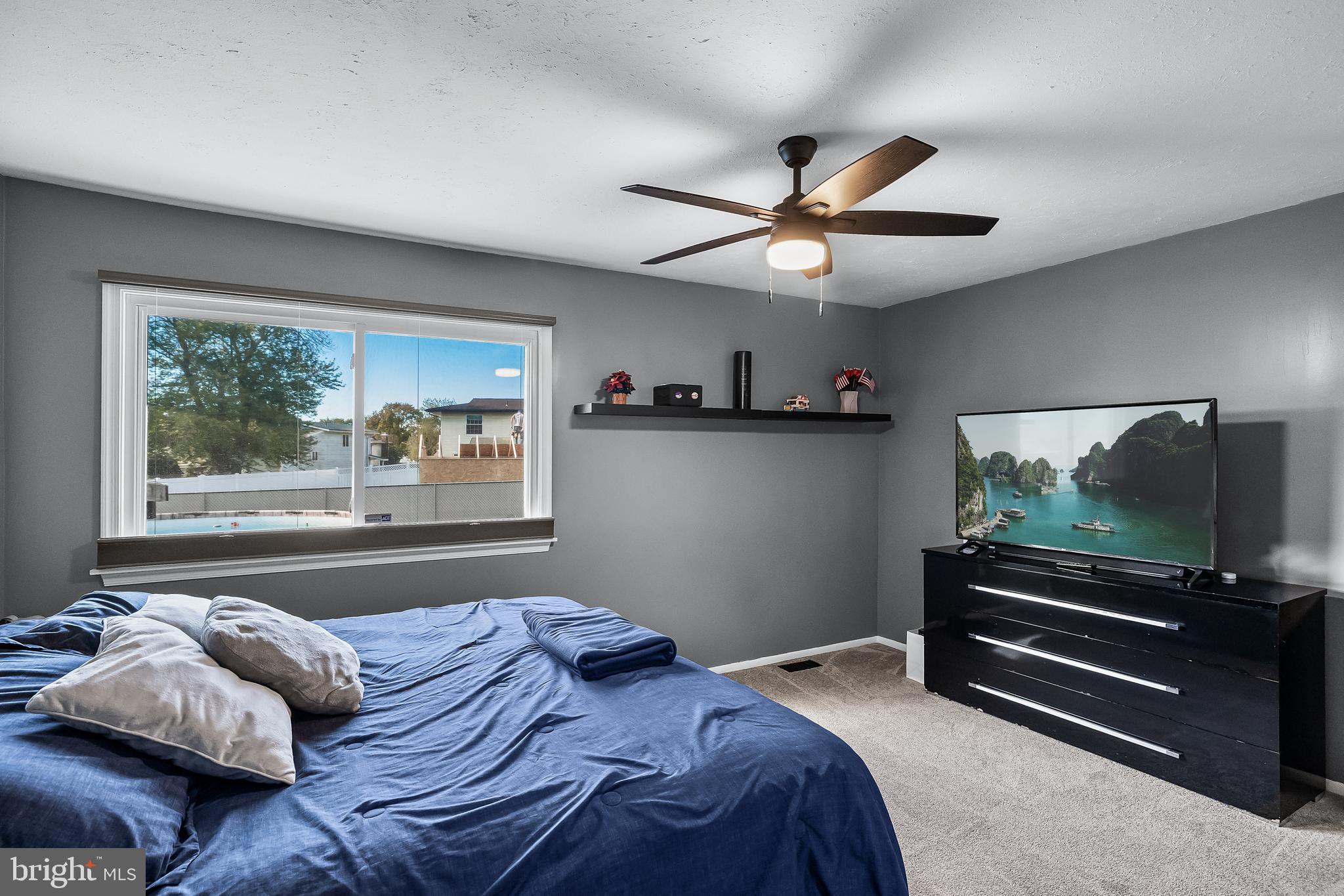18 Kingsley Road Mount Holly, NJ 08060 - Photo 15 of 27 a bedroom with a bed and a flat screen tv