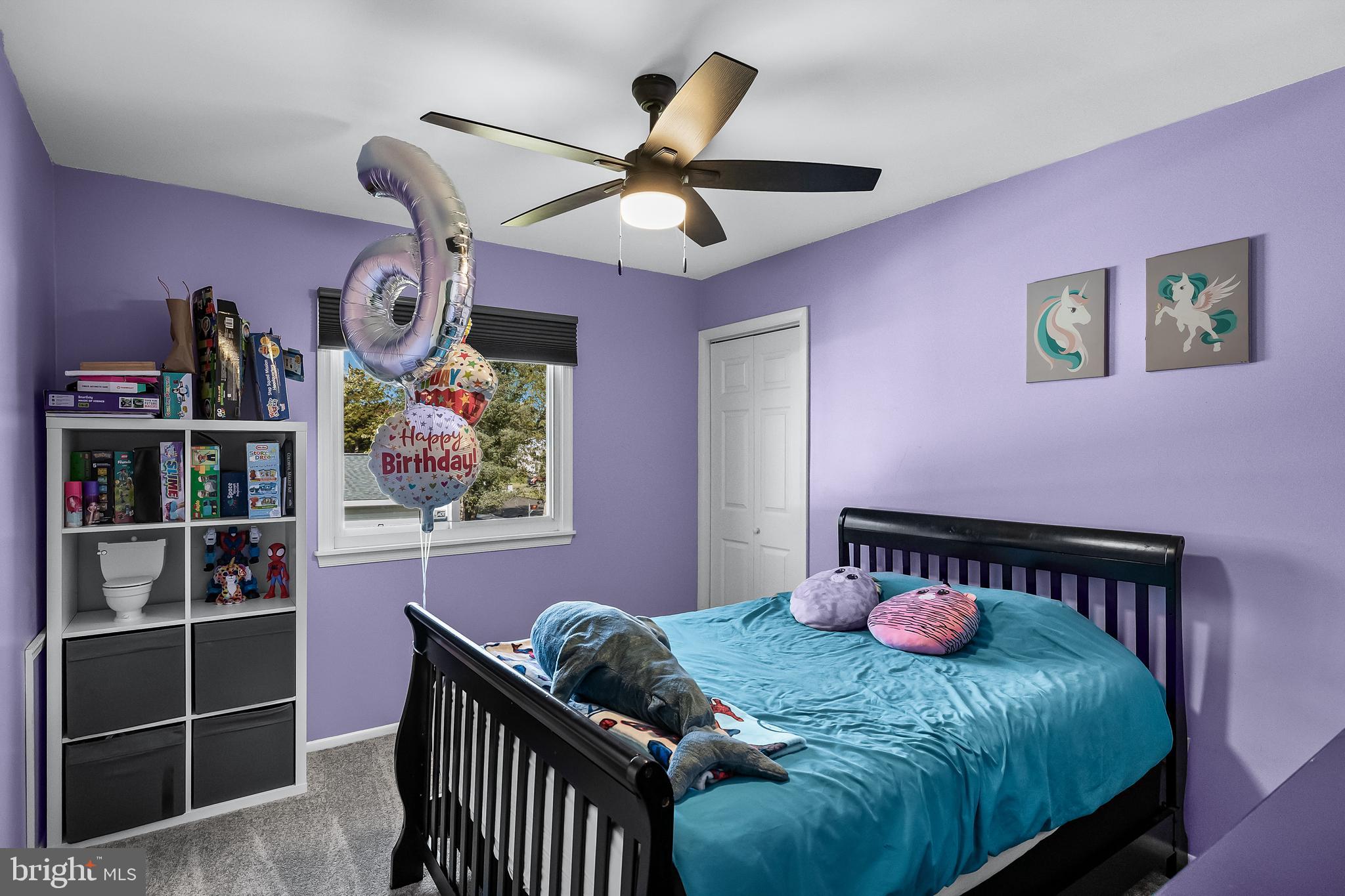 18 Kingsley Road Mount Holly, NJ 08060 - Photo 17 of 27 a bedroom with a bed and a chandelier