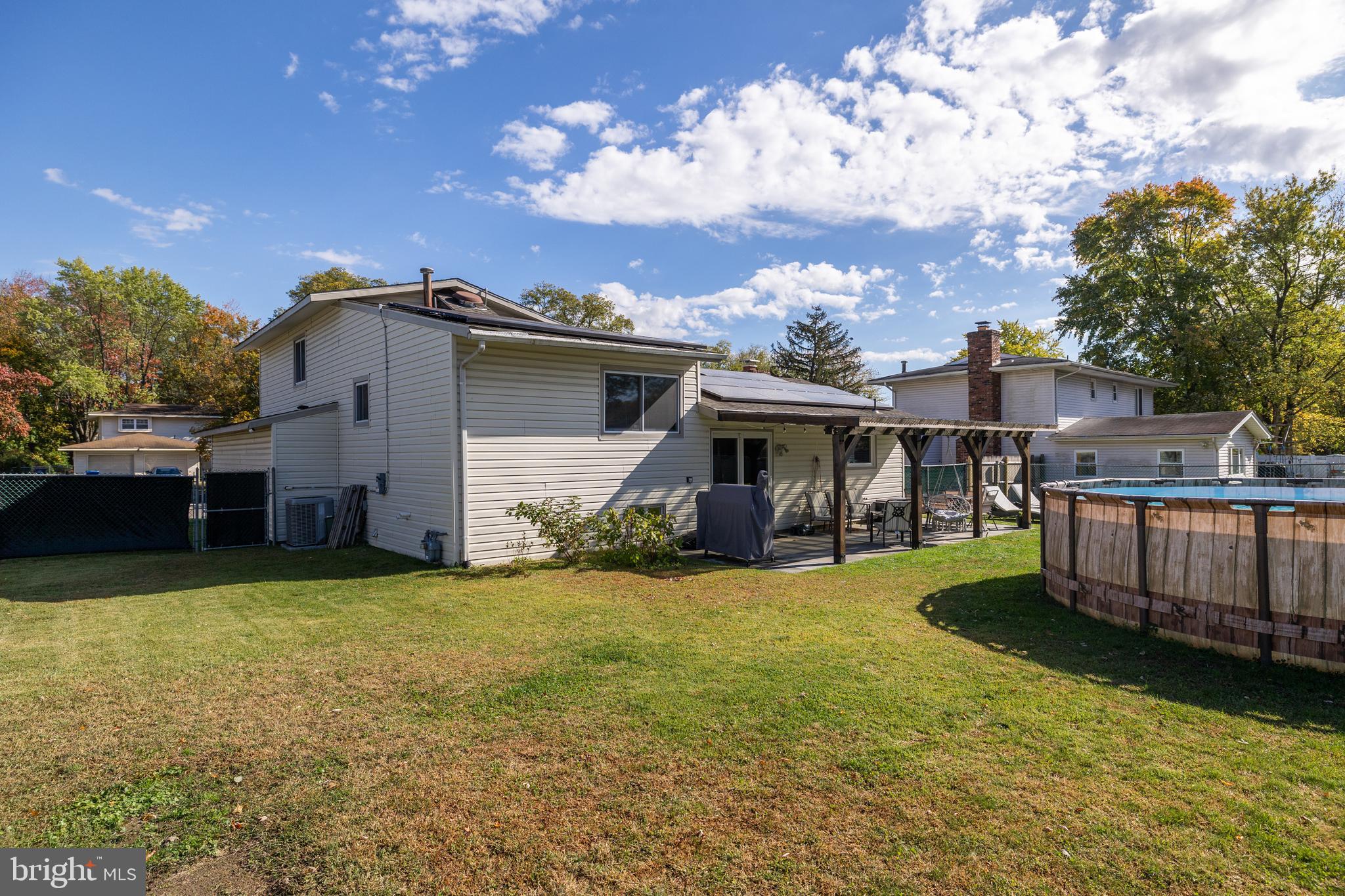 18 Kingsley Road Mount Holly, NJ 08060 - Photo 23 of 27 a view of a house with backyard and sitting area