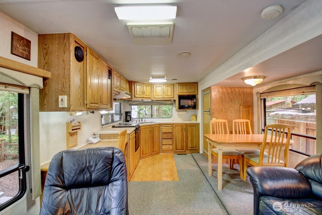 25-1 Goldrush Road Deming, WA 98244 - Photo 13 of 38 a living room with furniture and a large window