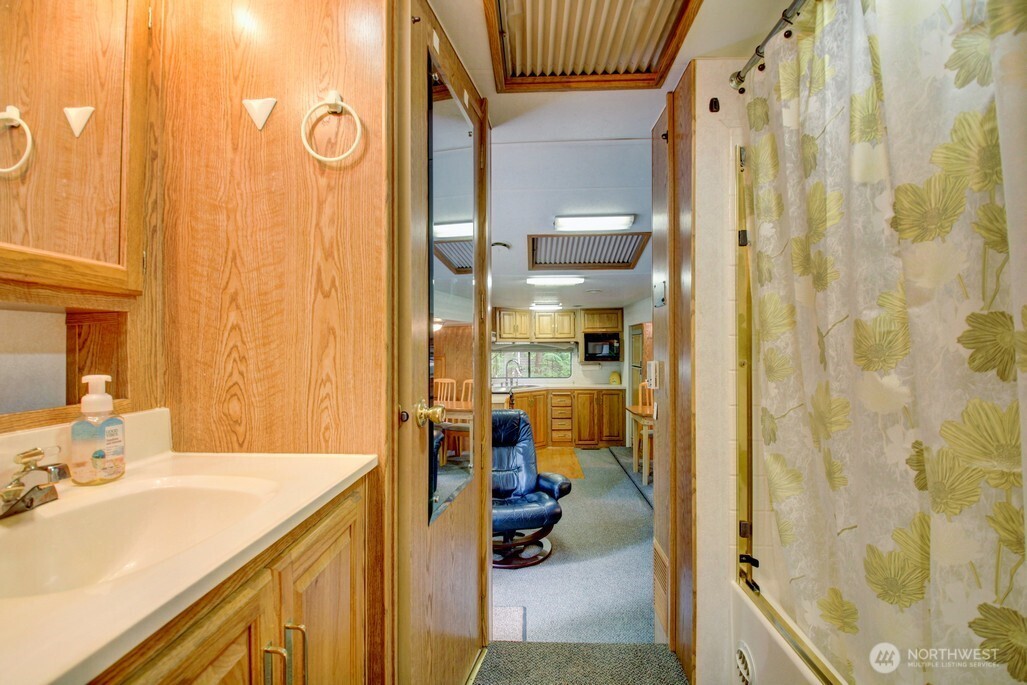 25-1 Goldrush Road Deming, WA 98244 - Photo 21 of 38 a bathroom with a sink and a mirror