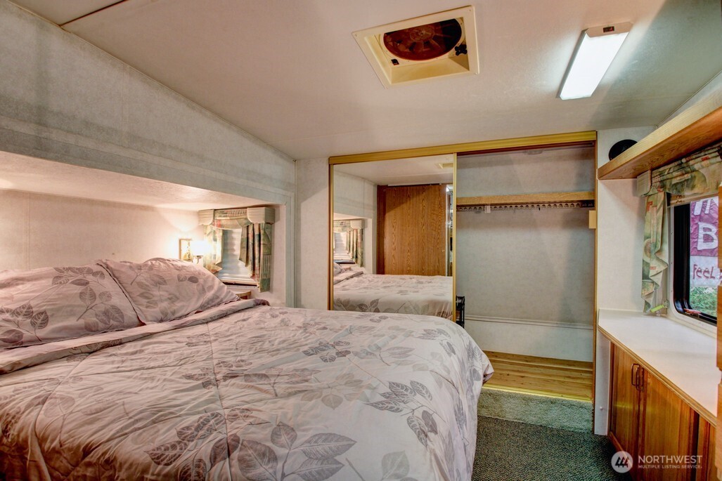 25-1 Goldrush Road Deming, WA 98244 - Photo 23 of 38 a bedroom with a bed and a cabinets