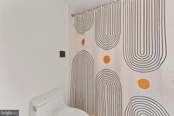 a view of a bathroom with a washing machine