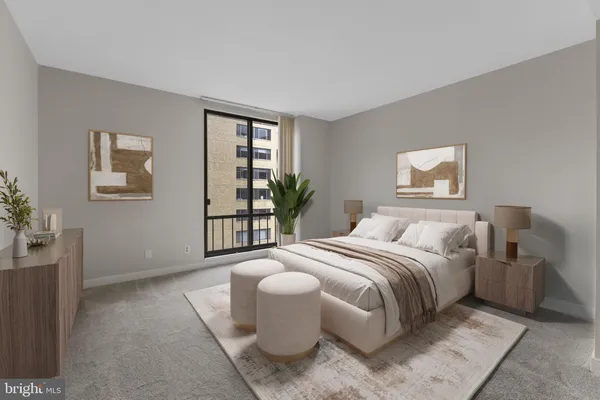 a spacious bedroom with a bed and a window