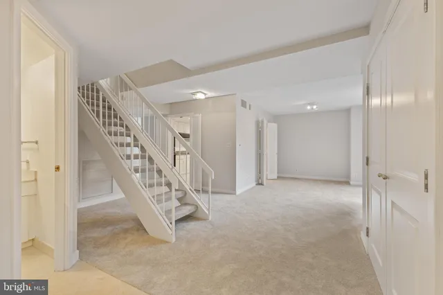 a view of an entryway with stairs