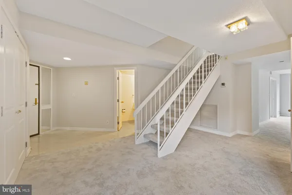 a view of an entryway with stairs